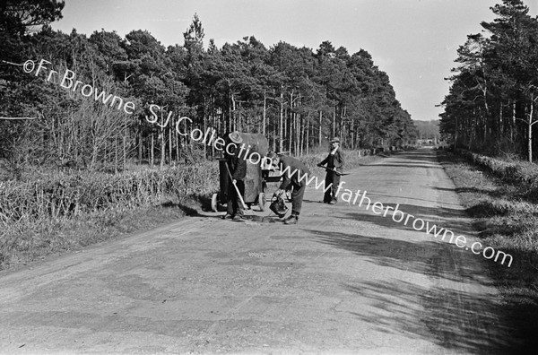 MEN REPAIRING ROAD